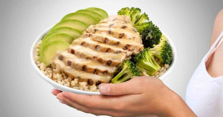 Pei Wei keto chicken avocado and broccoli protein bowl held in hands healthy low carb meal option