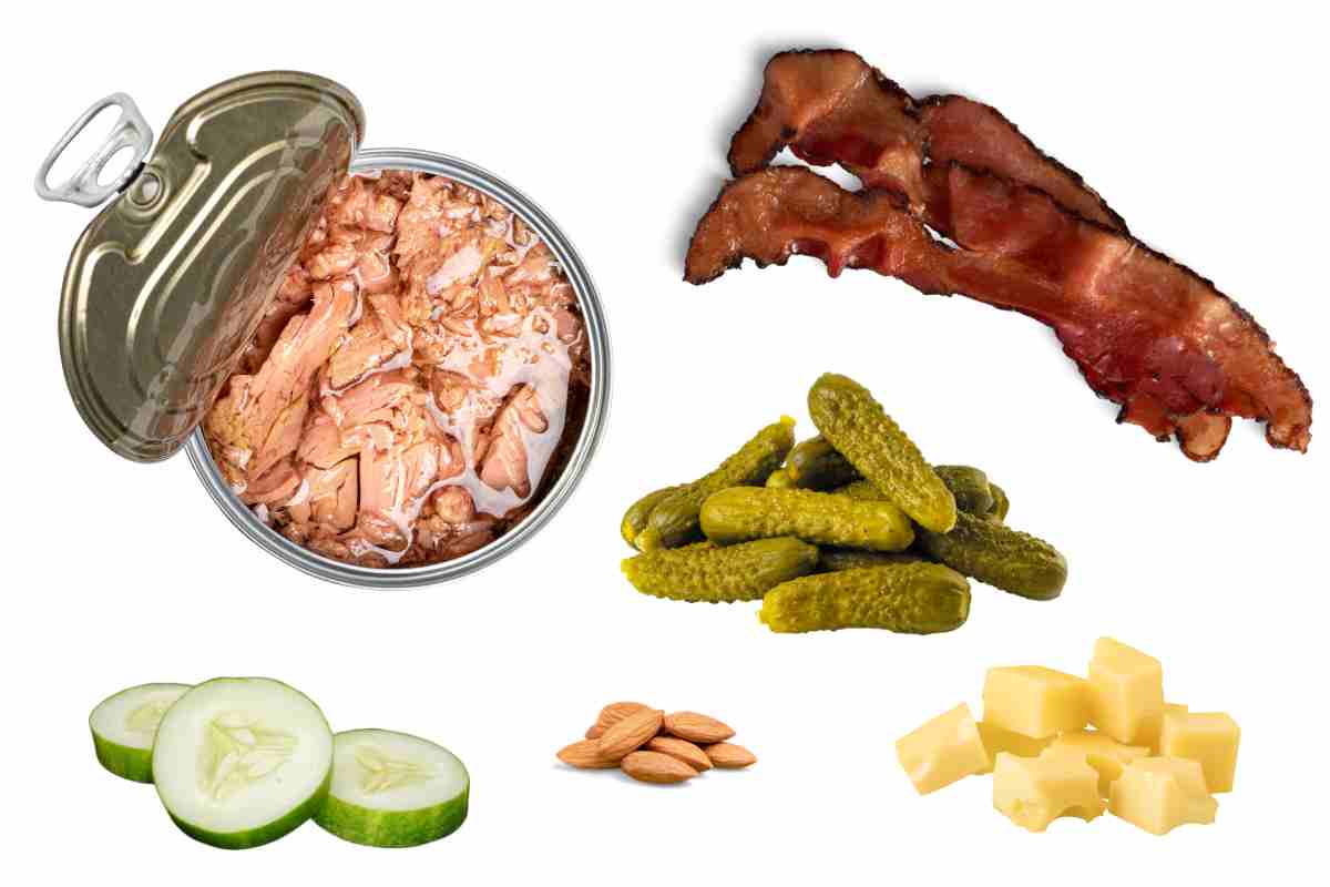 best carb free snacks photo featuring a sample of the zero carb snack ideas including tuna fish, cucumbers, pickles, cheese, bacon and almonds