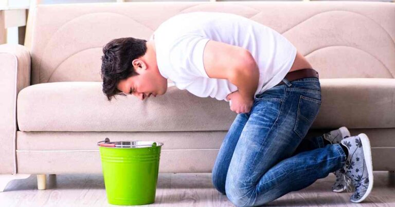man experiencing stomach mounjaro side effects after tirzepatide