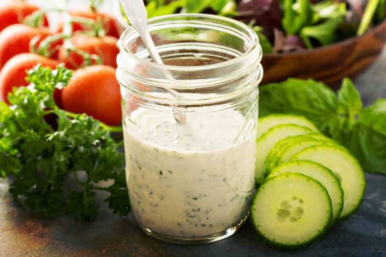 image of keto ranch dressing with cucumbers